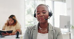 Face, black woman and customer service worker in call center laughing at funny joke while consulting. Telemarketing, comic and happy female sales agent, consultant or telemarketer talking in office.
