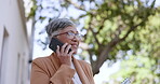 Senior woman, phone call and talking in city, speaking or chatting. Business deal, cellphone and female with 5g mobile smartphone outdoors in city networking, conversation or discussion with contact.