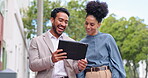 Teamwork, tablet and business people walking in city, researching, internet browsing or social media. Collaboration, travel and happy man and woman with touchscreen for web scrolling outdoors in town