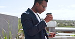 Businessman, coffee break with smartphone, reading and check email or social media with communication and technology outdoor. Black man with coffee, notification on social network and mobile phone.