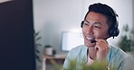 Call center, customer service and Asian man telemarketing consultant doing an online consultation. Office, headset and male ecommerce sales representative working on customer support in his workplace