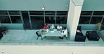 Business people, table and collaboration with business meeting on rooftop, top view and zoom with team chat and documents. Communication, teamwork and diversity with marketing strategy on balcony.