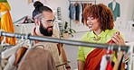 Fashion design team, collaboration and clothing designer in a creative studio with teamwork. Clothes stylist, planning and small business staff working in a workshop together on pattern construction