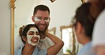 Happy couple, face mask and skin care in home bathroom mirror with love, hug and support. Interracial man and woman do morning beauty routine with facial dermatology product for health and wellness