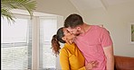 Couple, moving and man kissing woman, hug and real estate success, happy and smile in their new house. Property, purchase and young homeowner kiss in celebration home loan, success and milestone 