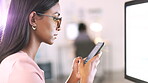 Phone, communication and research with a woman designer typing a text message while working in her office. Computer, mobile networking and a female design professional at work in a creative startup