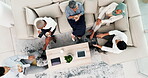 Corporate, lounge and business people on couch, relax and talk during lunch break with company chill spot top view. Diversity, social and employee group together with tablet and coffee break