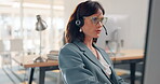 Woman, consultant and call center for telemarketing, customer support or service and advice at the office. Female consulting agent in contact us with headset on computer for online assistance or help