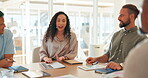 Meeting, collaboration and planning with a business woman and team talking in a boardroom for strategy. Leadership, workshop or teamwork with a female employee training a colleague group in an office