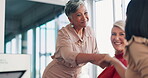 Business woman, handshake and greeting in meeting for happy introduction at the conference room. Employee shaking hands with marketing team and smile for b2b, partnership or teamwork at the workplace