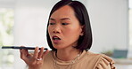 Asian woman, angry and phone call conversation in office for online business communication, employee stress and anxiety. Frustrated female, smartphone call and upset for online networking conflict