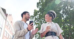 Businessman, woman and phone on outdoor walk to work for coffee cup, social media or comic meme. Man, business people and walking for conversation, support or happy with excited smile on urban street