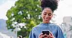 Phone, communication and a business black woman walking in a city park for 5g mobile networking. Mobile, social media and typing a text message with a female employee taking a walk alone outdoor