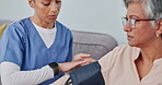 Healthcare, blood pressure and nurse with senior woman on sofa in home visit. Support, consultation and female medical caregiver checking or testing heart health of elderly patient in  living room.