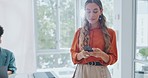 Business woman, phone and office social network of a marketing worker walking to a desk. Work, mobile communication and text of a creative media designer working on app strategy schedule online 