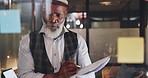 Strategy, planning and black man with sticky notes on glass wall brainstorming for new project. Development, motivation and small business startup at at night, man thinking and writing notes for idea