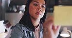 Sticky note, writing or woman planning a strategy for financial, sales or business growth in an office at night. Focus, data analysis or employee thinking of goals, mission or vision working on ideas