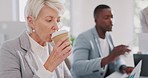 Meeting, coffee and senior business woman planning a corporate project with her team in an office. Professional, teamwork and elderly company manager drinking warm beverage while working in boardroom