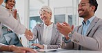 Handshake, partnership and business people clapping hands in celebration, congratulations or motivation. Collaboration, applause and senior woman shaking hands with company partner after success deal