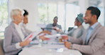 Meeting, collaboration and blur with a business team sitting in the boardroom for strategy or development. Documents, review and finance with a man and woman employee group working in the office