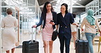 Business woman, phone and walking with luggage in travel for work trip partnership at the workplace. Happy women talking or chatting on a walk to the airport for opportunity or journey with suitcase