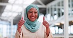 Muslim, thumbs up and business woman in office walking in workplace. Face, hand gesture and Islamic female worker with sign for success, motivation or agreement, support or approval, ok or like emoji