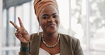 Face, peace and blowing a kiss with a business black woman looking positive in her office with a hand sign or gesture. Portrait, laugh and carefree with a happy female employee feeling cheerful