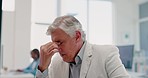 Stress, headache and senior businessman by computer reading sales email in office workplace. Mental health, burnout and tired elderly male employee with migraine, fatigue or depression from overwork.