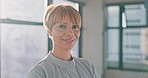 Business woman, smile and portrait of a employee in a office ready for work. Happy, corporate lawyer and professional law worker smiling with happiness proud of workplace success and innovation