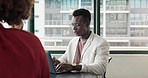 Idea, thinking and typing of black man on laptop in company boardroom working on professional online proposal. Planning, brainstorming and focus of businessman at corporate office in Chicago, USA.