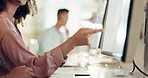 Computer, call center and woman explaining to her colleague with a consultation, sales or report. Technology, explanation and telemarketing female helping an employee with a project on a pc in office