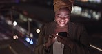 City, rooftop and black woman on a phone at night networking on social media or the internet. Technology, happiness and African lady browsing online with a cellphone on an outdoor balcony in a town.