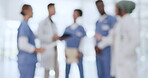 Blurred doctors, people or hospital meeting in surgery planning, treatment innovation or medicine research. Talking, global or healthcare nurses in teamwork, collaboration or diversity defocused view