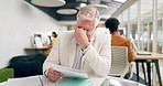 Elderly business man tired with paperwork, corporate burnout and finance report in coworking space. Headache, professional fatigue with senior fatigue and review financial documents in workplace