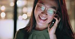 Phone call, night business and asian woman talking in office for communication, mobile networking or happy conversation. Young designer laughing, speaking and discussion on smartphone in dark startup
