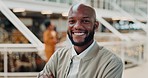 Face, business and black man with smile, leader and modern office with employee, arms crossed and project success. Corporate, African American male and entrepreneur with happiness, leadership and ceo