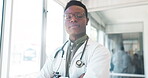 Black man, face or doctor arms crossed in hospital with surgery ideas, life insurance vision or medical wellness goals. Portrait, healthcare worker or thinking medicine employee in trust innovation