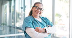 Portrait, healthcare and trust with a nurse woman in scrubs standing arms crossed while working in a hospital. Medical, health and insurance with a female medicine professional at work in a clinic