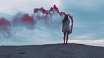 Red smoke bomb, beach and woman dancing for holiday celebration or vacation with energy, colorful pattern and blue sky. Art, energy and fireworks with young, adventure or gen z person jump and dance