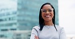 Black woman, portrait and business in city while happy with arms crossed outdoor with vision and pride. Face of entrepreneur person with urban buildings and motivation for career goals for future