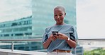 Black woman, phone and city business while happy and typing online for communication. Face of entrepreneur person with urban building background while on social media, writing post or trading website