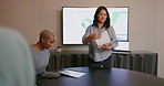 Business woman, presentation and team meeting in marketing, corporate statistics or analytics at office. Female in leadership workshop handing documents to employees for planning, strategy or ideas