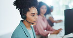 Contact us, crm or black woman in a call center consulting, communication or speaking of loan advice at office desk. Telemarketing, customer support or African agent helping a life insurance client