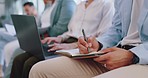 Presentation, row and business people writing in notebook for convention, conference or tradeshow. Workshop, seminar meeting and hands of audience sitting with book, typing on laptop and write notes