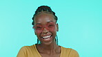 Face, fashion and sunglasses with a black woman in studio on a blue background to model eyewear. Portrait, smile and style with an attractive young female indoor to promote a designer brand of shades