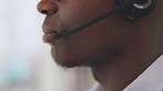 Face, mic and call center employee with black man talk with client, work with CRM and contact us. Profile, customer service with telemarketing or tech support help desk with 
consultant closeup
