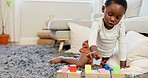 Black girl, building blocks and creative learning in family home lounge, growth and fun development. Happy african kids, educational brick toys and wood puzzle, montessori play and living room game