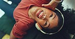 Woman, dancing and listening to music on sofa with zoom out on planet earth in global networking or streaming at home. Female dancer enjoying audio soundtrack on living room couch upside down indoors