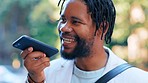 Talking, call and black man with a phone for a message, conversation and communication in the city. Happy, laughing and African guy speaking into a mobile microphone for discussion and audio