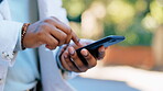 Hands, typing and phone in city for social media, texting or web scrolling outdoors in street. Technology, cellphone and black man using 5g mobile smartphone for internet browsing and networking.